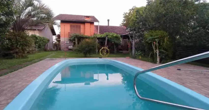 Imperdível, imóvel com duas casas, 380m² construídos em terreno lindo em plano de 1500m² em nova santa rita/rs