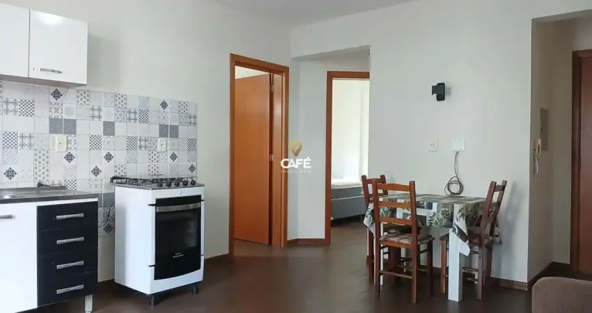 Apartamento no centro, 2 dormitórios, 1 banheiro, 1 vaga de garagem