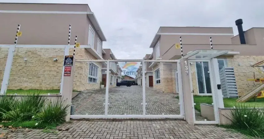 Sobrado novo em condomínio estilo contemporâneo, 03 dormitórios, sendo 01 suíte, 02 vagas de garagem.