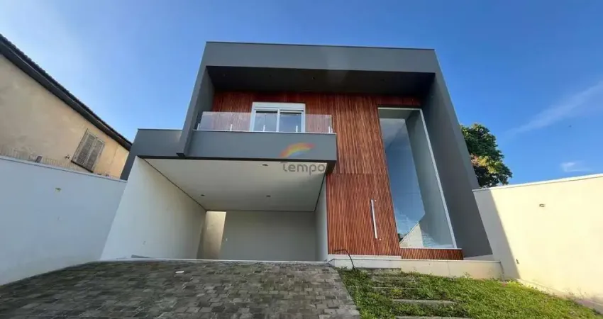Belíssima casa contemporânea, possui 243m² de área construída, sendo 03 suítes,  bairro Jardim Mauá, Novo Hamburgo-RS.
