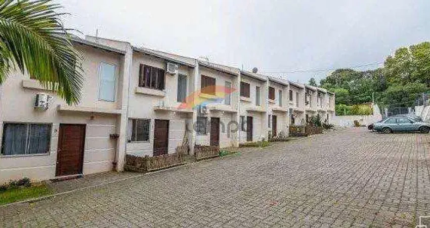 Sobrado em condomínio com 2 dormitórios, 1 vaga de garagem em Novo Hamburgo
