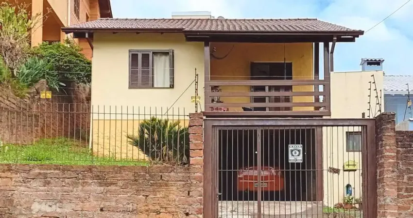 Casa bairro canudos com sacada vaga de garagem pra 2 automóveis