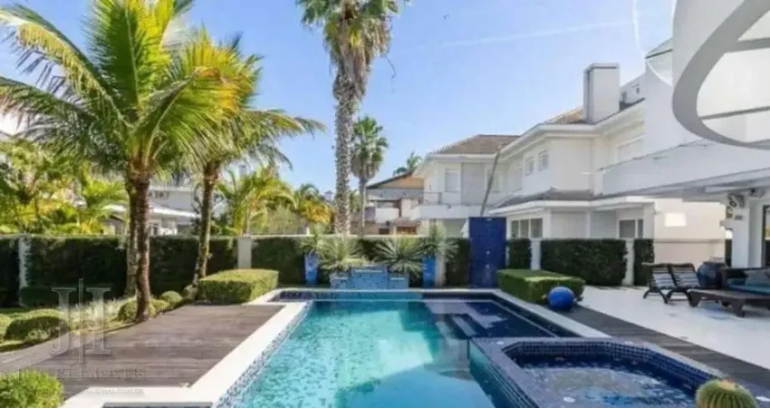 Casa 5 suites a 50 metros do mar em Jurerê Internacional