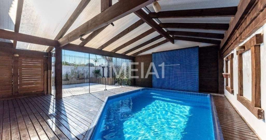 Casa com 4 quartos para alugar na Rua Indianápolis, 240, Três Figueiras, Porto Alegre