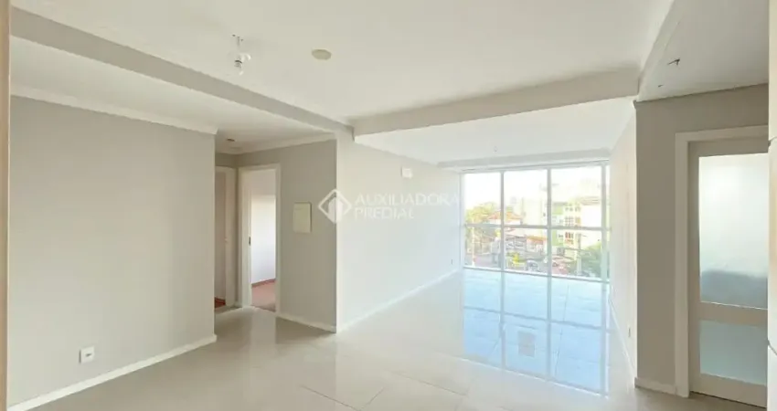 Apartamento de 2 Dormitórios com Suíte, 2 Vagas e Churrasqueira – Desocupado e Pronto para Morar!