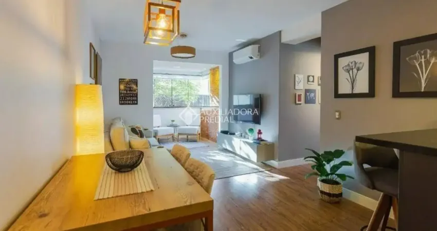 Apartamento 2 dormitórios com suíte, semimobiliado no passo da areia