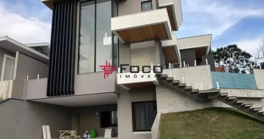 Casa com 4 dormitórios á venda, 477 m2 por r$ 3.600.000,00 - condomínio residencial jaguary -