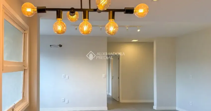 Apartamento com 2 dormitórios/quartos, garagem e churrasqueira no bairro Auxiliadora.