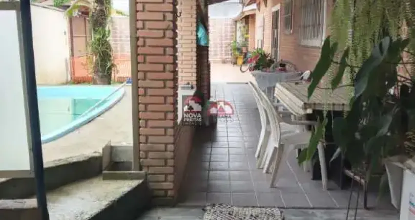 Casa com 3 quartos à venda na Rua Girassol, 215, Travessão, Caraguatatuba