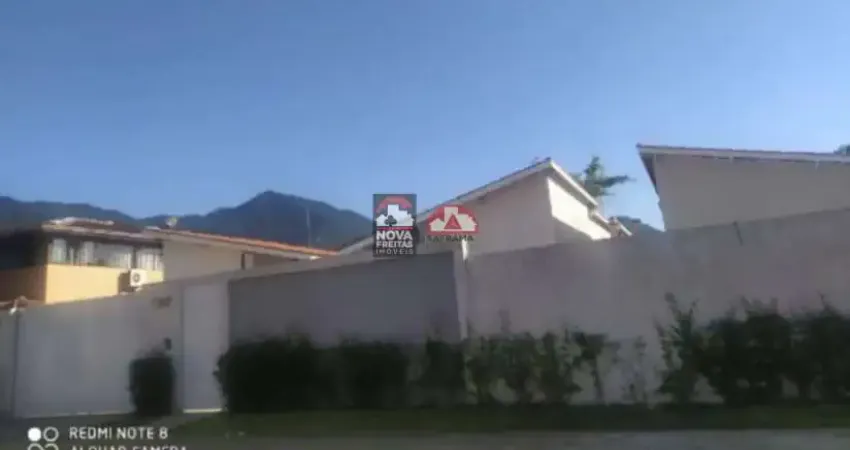 Casa em condomínio fechado em Caraguatatuba no bairro Massaguaçu
