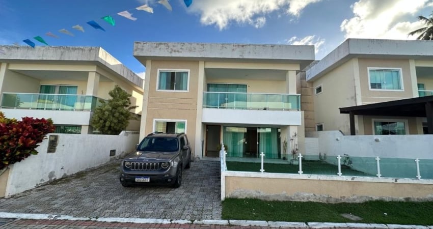 Excelente casa em Buraquinho no Condomínio Jardim Tropical - Localização fantástica - 4/4 sendo 3 suítes - Bem dividida - Nascente - Área gourmet - 2 vagas