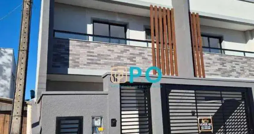 Sobrado com 3 dormitórios sendo 01 suíte à venda, 104 m² por R$ 639.500 - Gravatá - Navegantes/SC