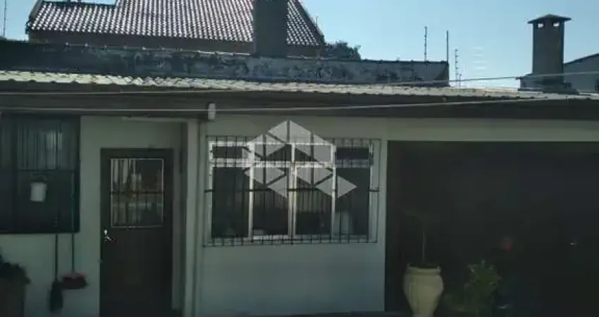 Casa com 3 quartos à venda na Rua Francisco Braga, 32, Partenon, Porto Alegre