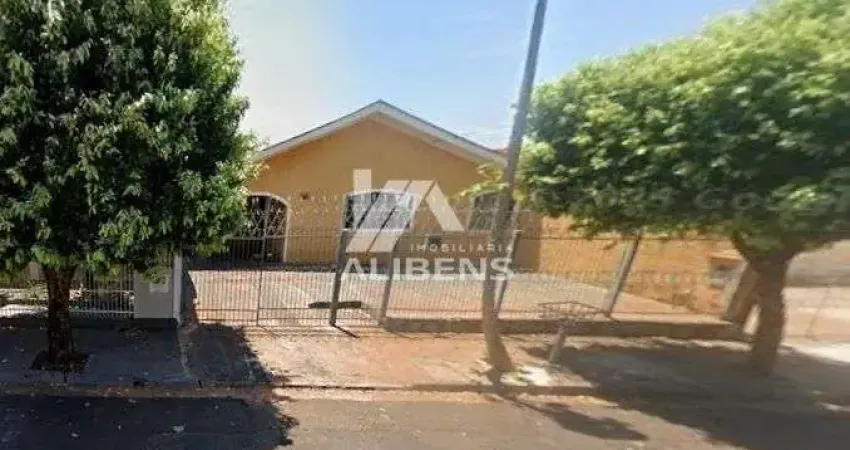 Casa com edícula