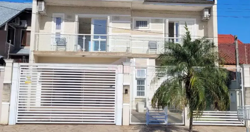 Casa à venda na Rua Andrômeda, 319, Moinhos De Vento, Canoas