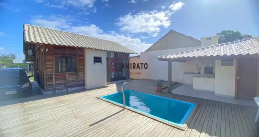 Casa à venda em Arroio do Sal com churrasqueira, piscina adulta e área de lazer