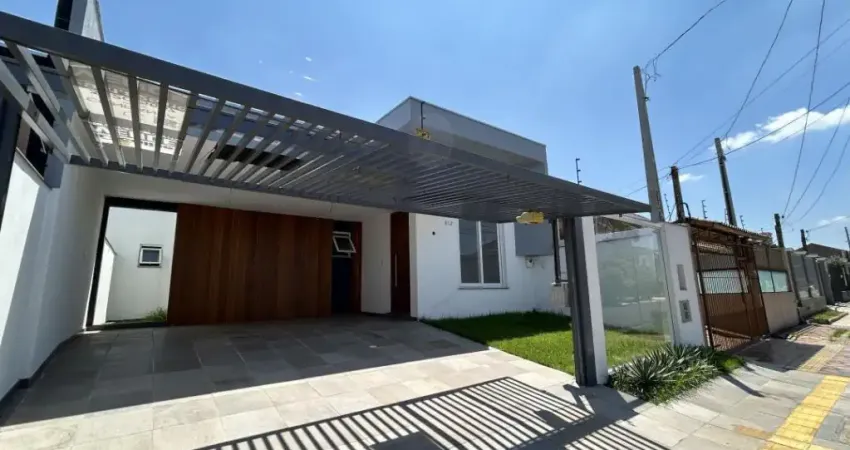 Casa a venda com 3 dormitórios, 3 banheiros e 2 vagas de garagem cobertas no bairro Igara em Canoas!