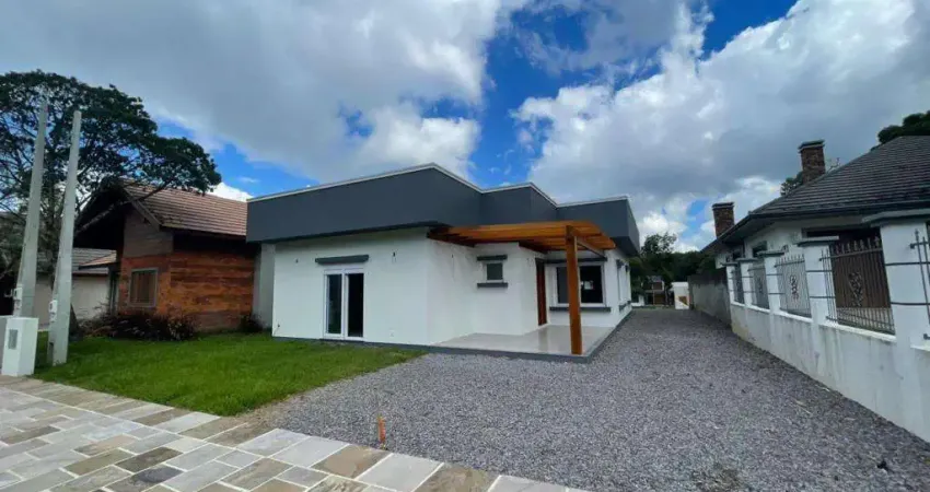 Casa 3 Dormitórios à venda no Bairro Carniel com 165 m² de área privativa - 2 vagas de garagem