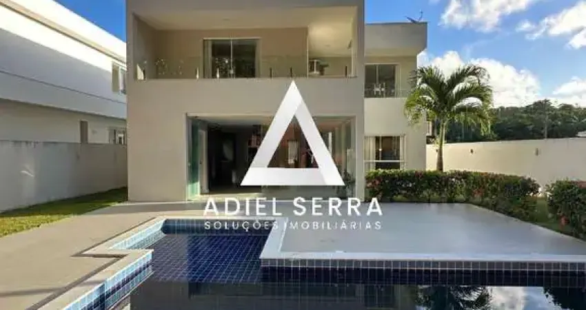 Alphaville litoral 3 - 4 quartos sendo 3 suítes - 2 lavabos - 4 vagas - Piscina e área gourmet - Sala ampla com pé direito duplo