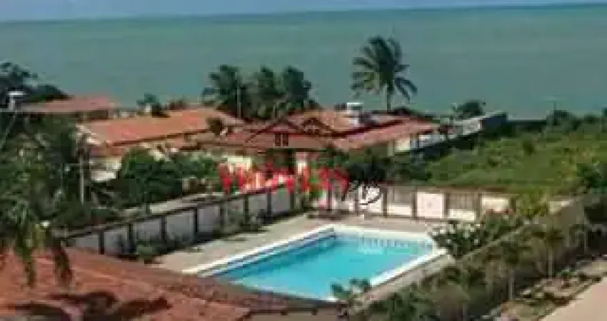 Casa a venda a menos de 50 metros da praia com 3 suítes.