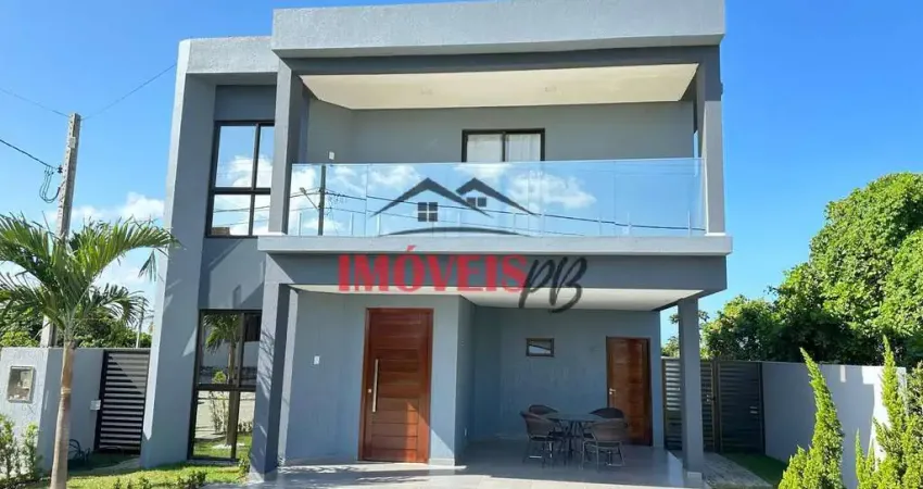 Casa em condomínio fechado , 04 quartos sendo 02 suítes e com vista mar