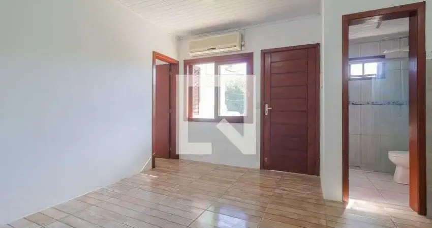Casa / Sobrado em Condomínio para Aluguel - Vila Nova, 1 Quarto,  32 m² - Porto Alegre