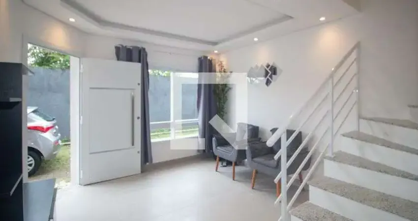 Casa com 3 quartos para alugar na Rua Doutor Mário Totta, Camaquã, Porto Alegre