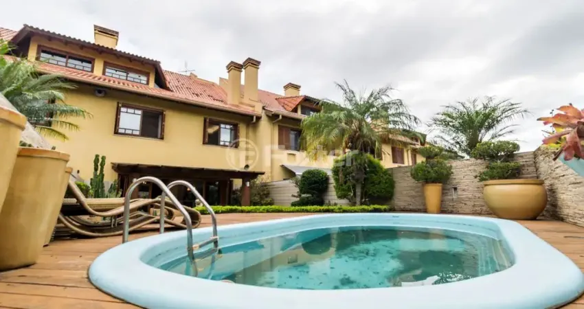 Casa em Condomínio 3 dorms à venda Avenida Luiz Manoel Gonzaga, Três Figueiras - Porto Alegre