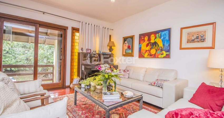 Casa 4 dormitórios à venda Rua Desembargador Hugo Candal, Três Figueiras - Porto Alegre