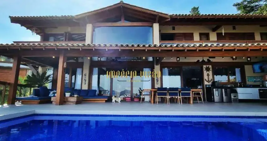 Casa de Alto Padrão à venda com 9 Suítes, sendo 1 Master, Espaço Gourmet e Piscina com Borda Infinita no Condomínio Fazenda Arrozal - IlhaBela-SP