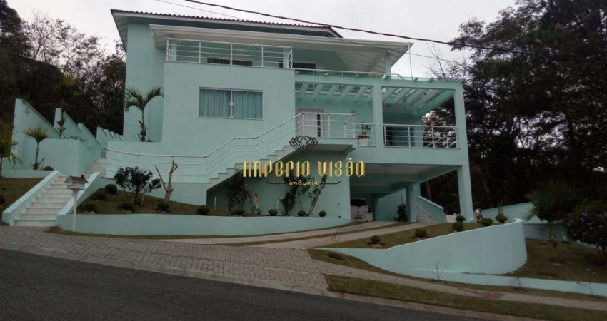 Casa de Alto Padrão com 4 Suítes, Cozinha Americana e Piscina á venda na reserva de Ibirapitanga Arujá divisa com Santa Isabel-SP
