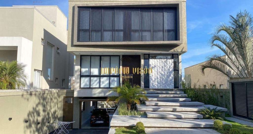 Casa de Luxo com área gourmet e piscina à venda no Condomínio Arujá 5, infraestrutura magnífica e totalmente moderna.