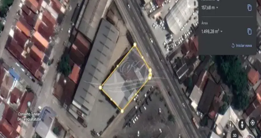ÁREA ESCRITURADA DE 1.498,28M DE FRENTE PARA AV RIO BRANCO, COM VÁRIAS CONSTRUÇÕES, CARAGUATATUBA/SP
