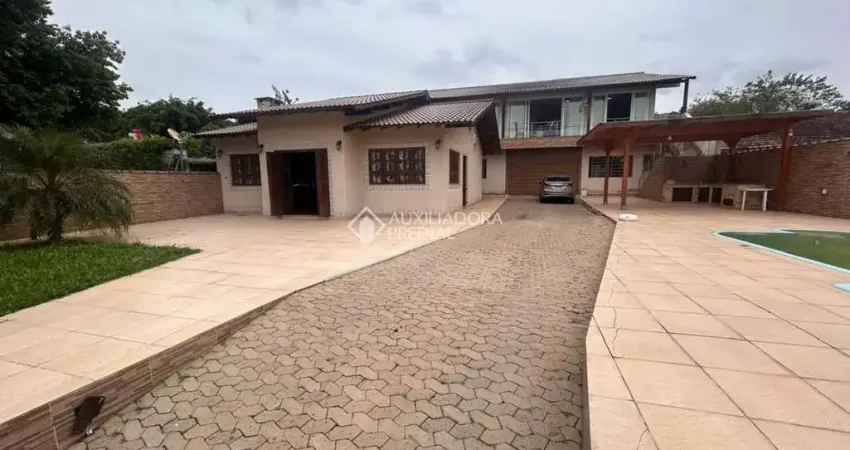 Casa com 4 quartos à venda na Rua Júlia Correia de Barros, 17, Feitoria, São Leopoldo