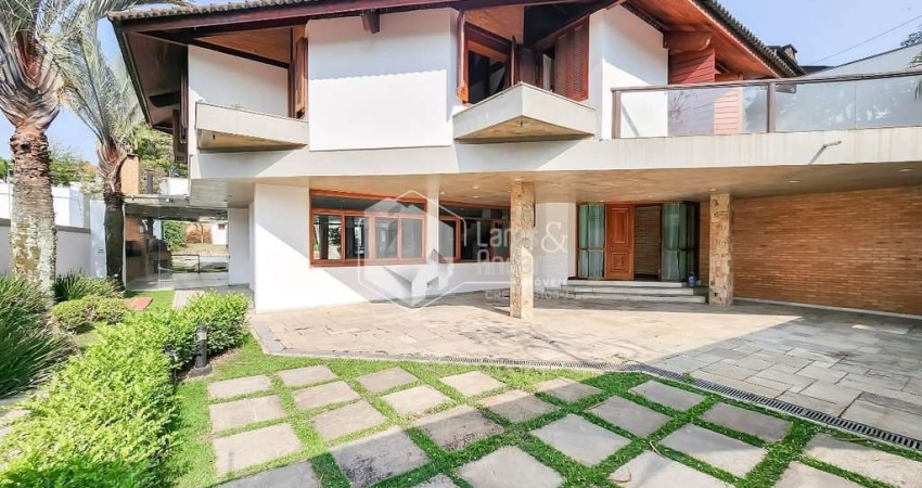 Casa tipo para venda com 4 quartos, sendo 3 suítes, 409m²