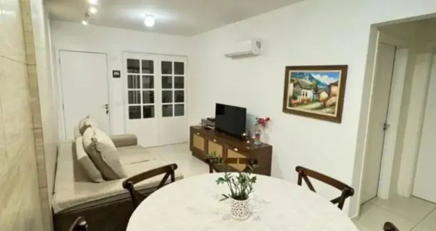 Apartamento no centro andar alto, sol manhã, 2 garagens e 2 quartos