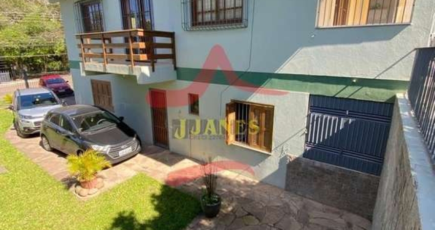 Casa com 4 quartos à venda na Rua Açores, 776, Tarumã, Viamão