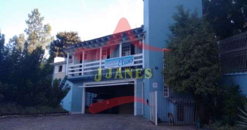 Casa com 4 quartos à venda na Joao Carlos Vialle Dias, 1347, Tarumã, Viamão