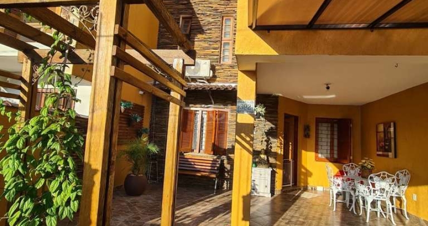 Casa com 4 quartos à venda na Rua Baldoino Bottini, 392, Hípica, Porto Alegre