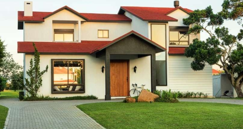 Sobrado à venda, 4 quartos, 2 suítes, 2 vagas, Condomínio Green Village - Xangri-Lá/RS