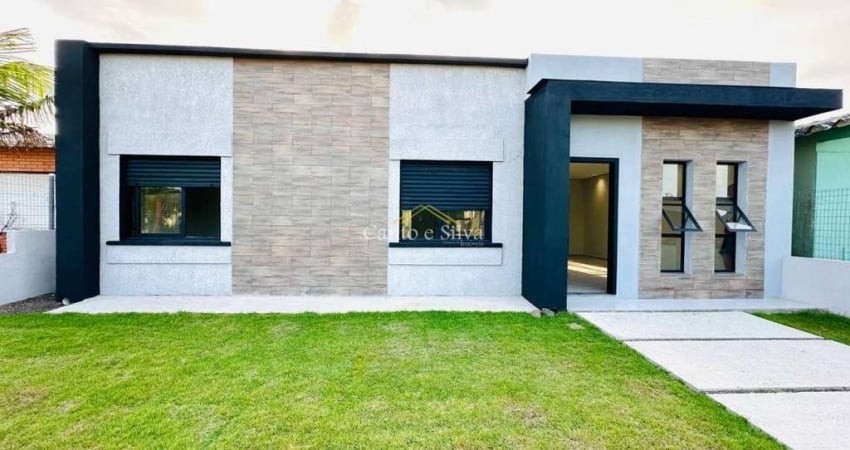 Casa com piscina próxima ao centro de Atlântida Sul