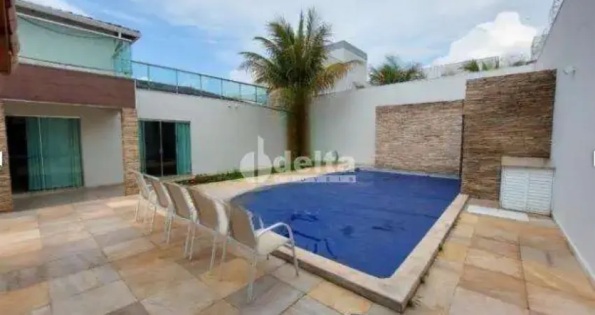 Casa residencial disponível para locação no bairro Jardim Karaíba em Uberlândia-MG
