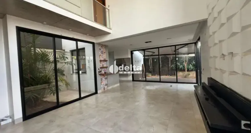 Casa residencial disponível para locação no bairro Santa Mônica em Uberlândia-MG.