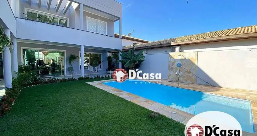 Sobrado à venda no condomínio Portal do Sol, com 4 suítes, piscina e espaço gourmet, Tremembé - SP.