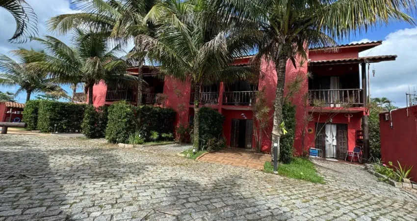 Casa em condomínio localizada lado praia no bairro Palmeiras, Itanhaém, a 300 m do mar, com 2 dormitórios sendo 2 suítes, 1 banheiro, 1 sala, 1 cozinha, 1 vaga de garagem, área gourmet, churrasqueira