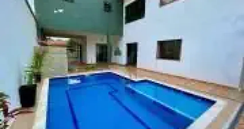 Casa na praia com 4 quartos, piscina e área gourmet em Peruíbe.