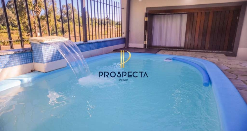 CASA DE 03 DORMITÓRIOS SENDO 01 SUÍTE COM PISCINA AQUECIDA NO BAIRRO DESVIO RIZZ