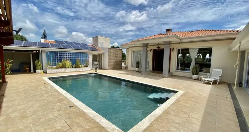 PARQUE DA FAZENDA - AT 1.230m² - AC 700m² - 4 SUÍTES - 6 VAGAS - PISCINA