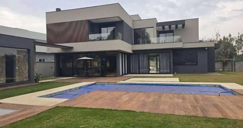 TERRA CAXAMBÚ - 4 SUÍTES - 4 VAGAS - AT 1.070m² - AC 400m² - PISCINA