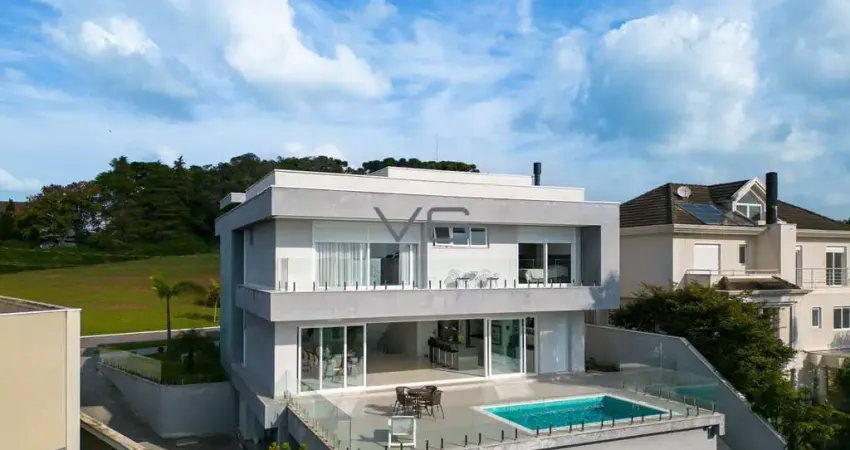 Casa Alto Padrão com 4 suítes, 583 m² privativos, 4 vagas de garagem, no Alphaville, Pinhais-PR.